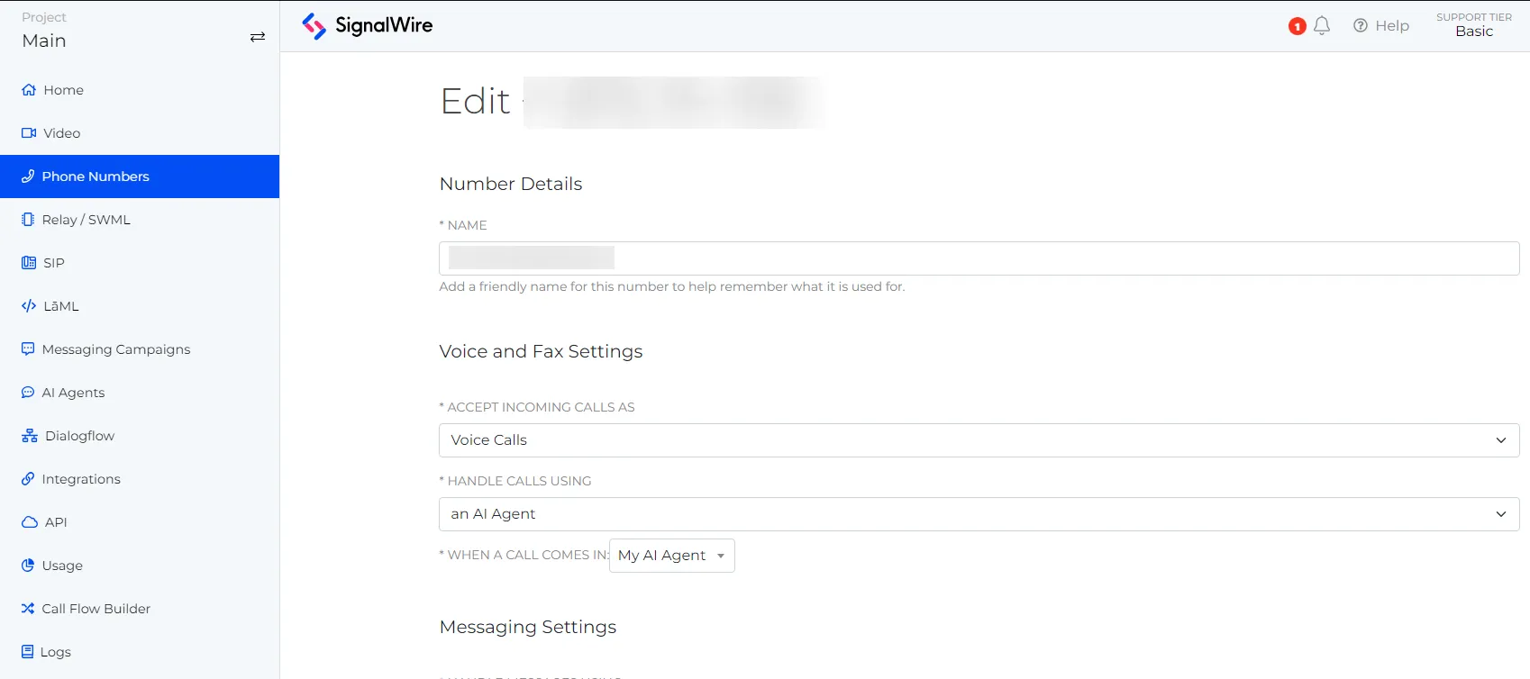 SignalWire Dashboard that shows the sidebar option 'Phone Numbers' selected, and is displaying the Phone Numbers Settings page. The option AI Agent is selected underneath the 'Handle Calls using' section.