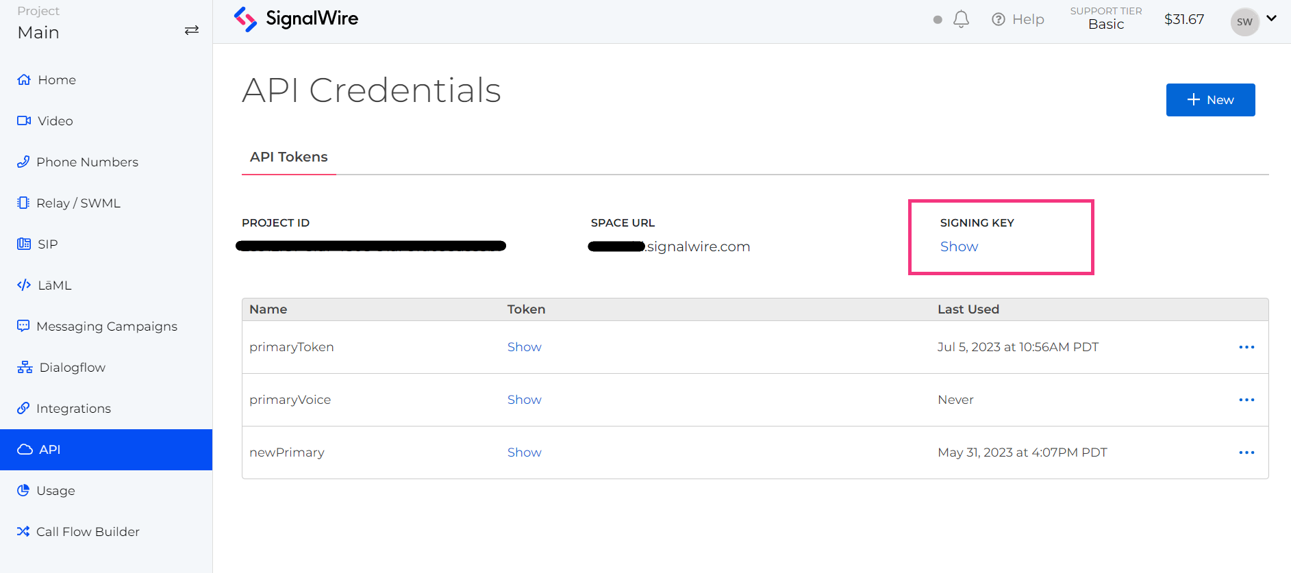 A screenshot of a SignalWire Space showing an active Project called 'Main'. The API tab is selected. The API Credentials section lists information about API Tokens including Project ID, Space URL, and Signing Key. Signing Key is circled in red.